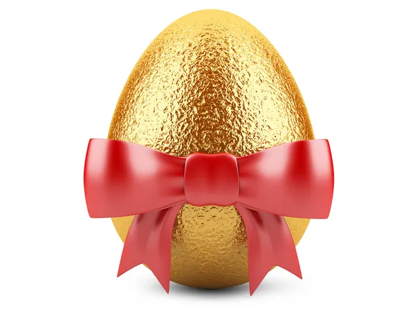 Золотое пасхальное яйцо с красной лентой — стоковое фото