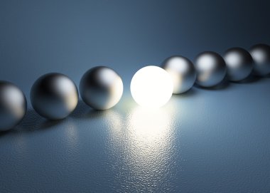 parlak parlayan küre üst üste. liderlik kavramı
