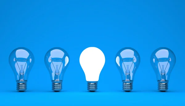 Idea or leadership concept on a blue background — Stock Photo, Image