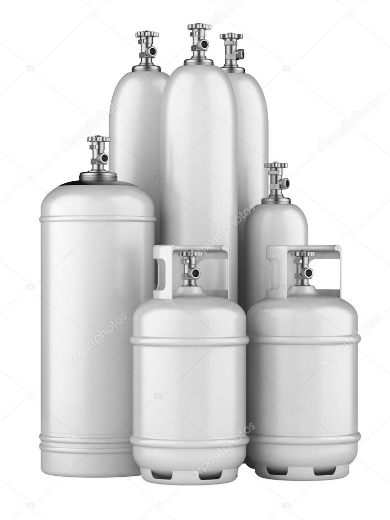 white cylinders with compressed gas