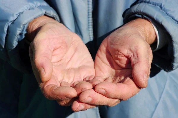 Mãos de um mendigo — Fotografia de Stock