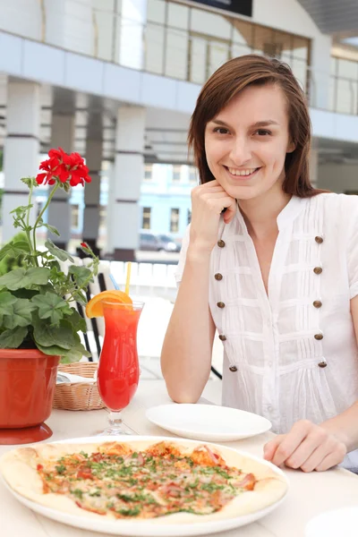 Beautiful girl in a cafe — Stock Photo, Image