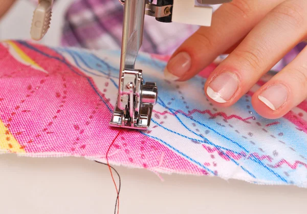 Hand sewing on a machine — Stock Photo, Image