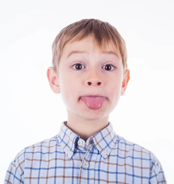 Small boy is showing his tongue — Stock Photo, Image