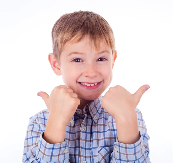Šťastný chlapec ukázal prstem — Stock fotografie