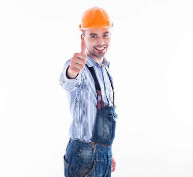 bir inşaat işçisi kask thumbs yapmak ile portresi