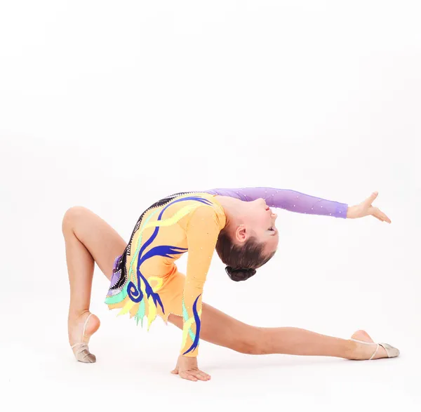 Beautiful flexible girl gymnast over white background — Stock Photo, Image