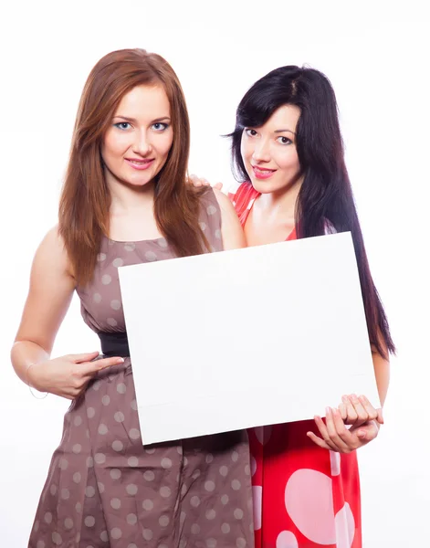 Two girls with banner. — Stock Photo, Image