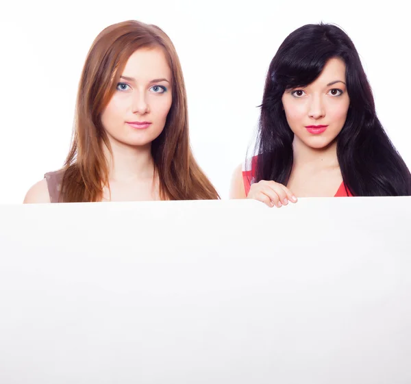 Two girls with banner. — Stock Photo, Image