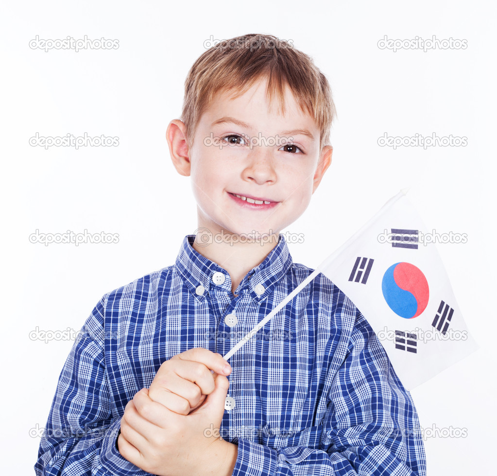 A little boy with south koreanian flag on the white background