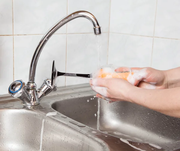 Washing of a wine glass — Stock Photo, Image