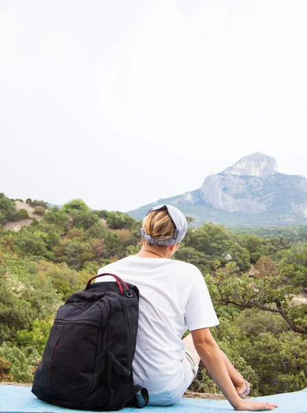 Young woman with backpack — Stock Photo, Image