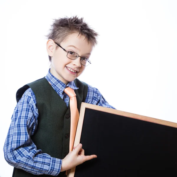 Retrato de menino alegre apontando para banner — Fotografia de Stock