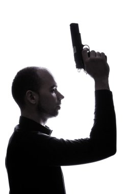 Kaukasische one-man houden pistool portret silhouet