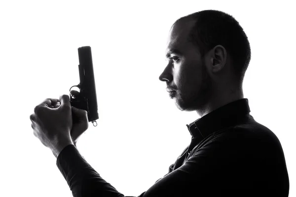 One caucasian man holding gun portrait silhouette — Stock Photo, Image