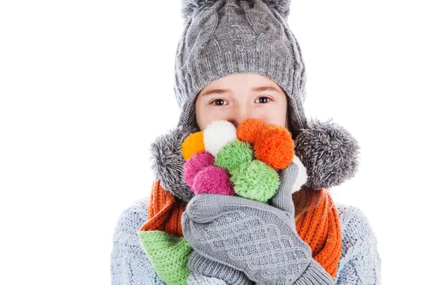 Beautiful little girl in cap and scarf — Stock Photo, Image