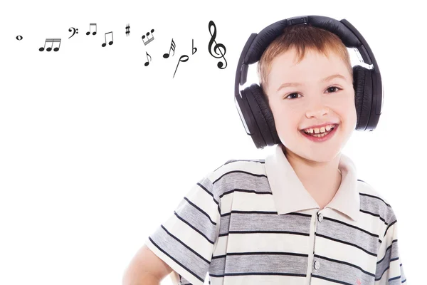 Der kleine Junge hört Musik — Stockfoto