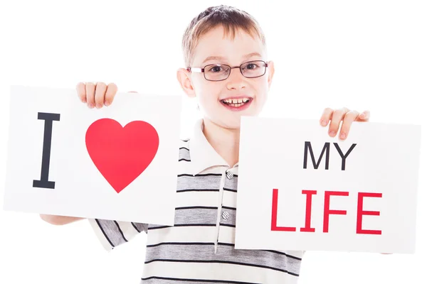 Gelukkige jongen met teken — Stockfoto