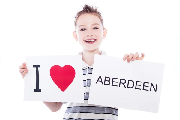 Jongen met de stad ondertekenen aberdeen — Stockfoto