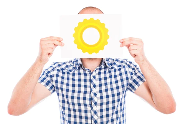 Man with gear sign — Stock Photo, Image