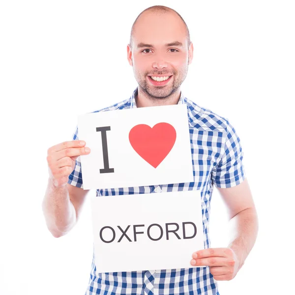 Man with city sign Oxford. — Stock Photo, Image