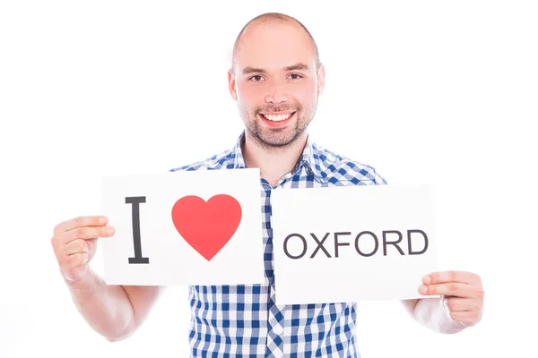 Man with city sign Oxford. — Stock Photo, Image