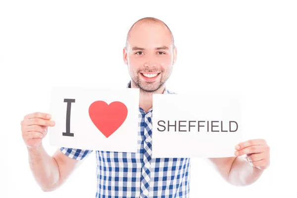 Man with city sign Sheffield. — Stock Photo, Image