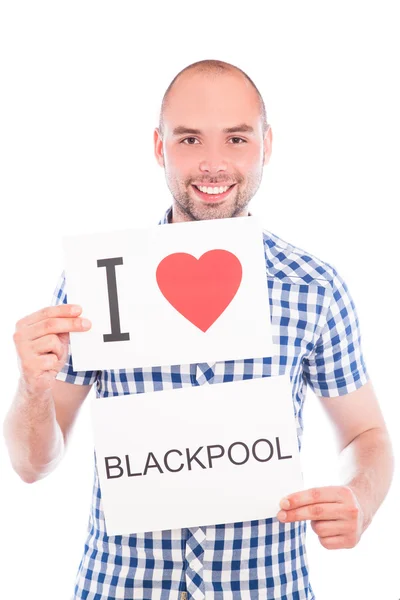 Uomo con cartello città Blackpool . — Foto Stock