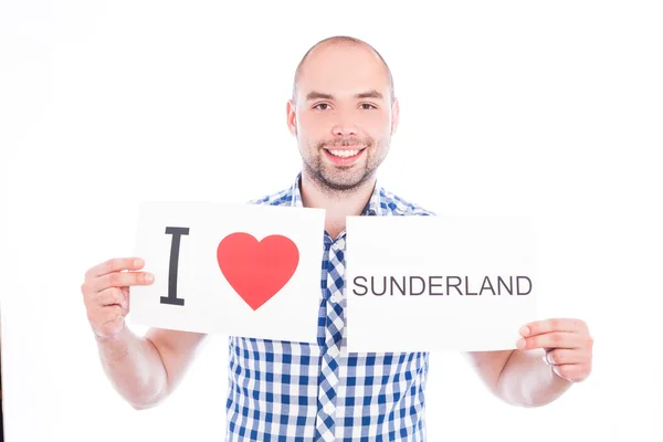 Uomo con cartello città Sunderland . — Foto Stock