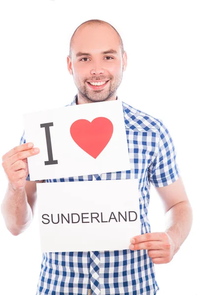 Man with city sign Sunderland. — Stock Photo, Image