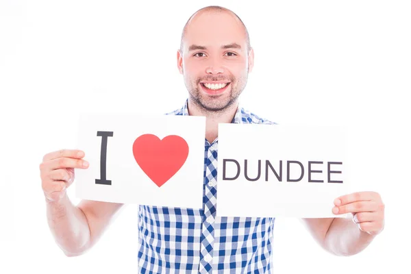 Man with city sign Dundee. — Stock Photo, Image