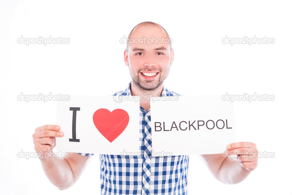 Man with city sign Blackpool.