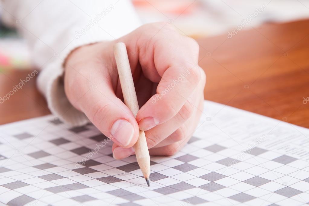 Crossword puzzle close-up.