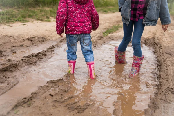 Two Smiling Girls Run Puddles Play — Stock Photo, Image