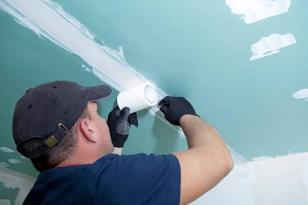 Worker Mounts Mesh Seams Sheets Drywall — Stock Photo, Image