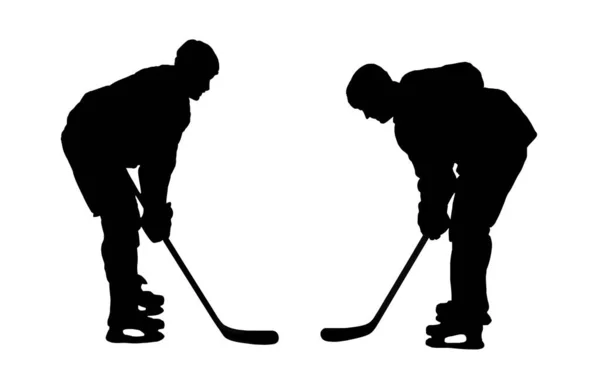 Silhouetten Von Zwei Hockeyspielern Isoliert Auf Weißem Hintergrund lizenzfreie Stockbilder