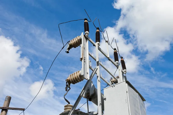 Energy and technology: electrical post by the road with power li — Stock Photo, Image