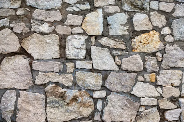 Steinmauer als Hintergrund — Stockfoto