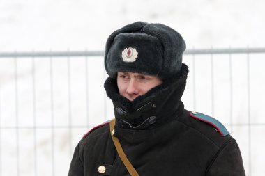 SAMARA, RUSSIA - March 6:Russian policeman in winter wear on Mar clipart