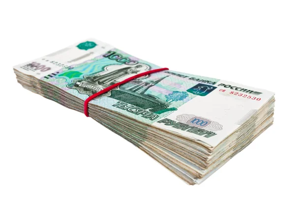 Российские рубли обёрнуты резиной на белом фоне — стоковое фото