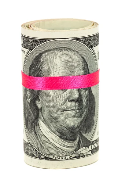 100 US dollar wrapped by ribbon over white background — Stock Photo, Image