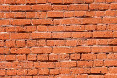 Arka plan olarak eski kırmızı tuğla duvar