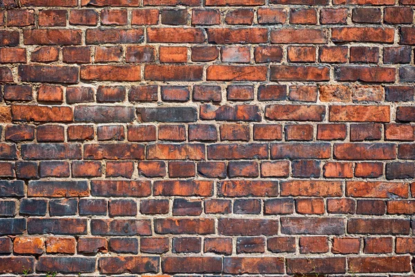 Vieux mur de briques rouges altérés comme fond — Photo