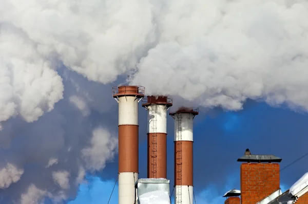 Smoking chimneys other blue sky — Stock Photo, Image