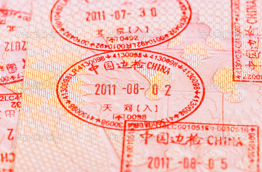 Chinese Visa entry and exit stamps in passport