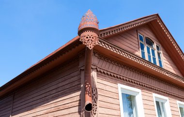 The old rainwater downpipe on wooden house clipart