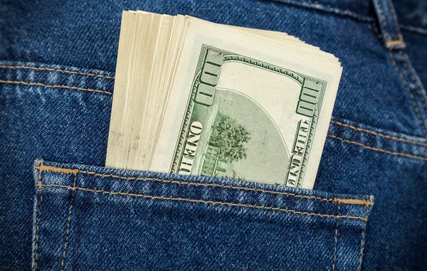 Stack of hundred dollar bills in the back jeans pocket — Stock Photo, Image