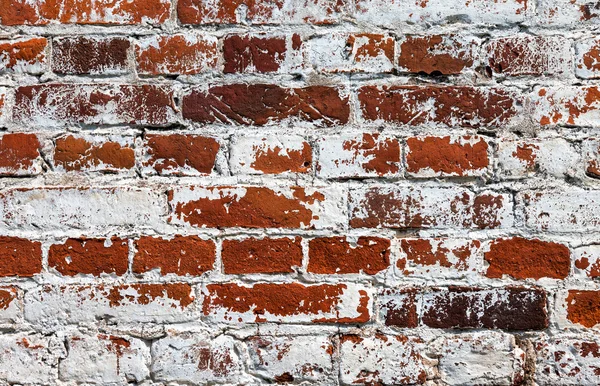 Old weathered grunge red brick wall as background — Stock Photo, Image