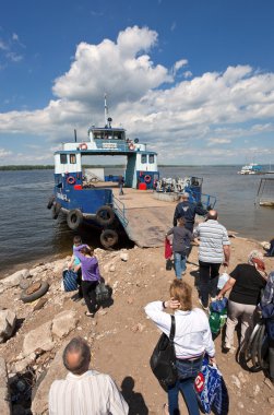 SAMARA, RUSSIA - MAY 26: Ferry across Volga river in summertime clipart