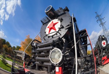 SAMARA, RUSSIA - OCTOBER 13: Old steam locomotive with red star clipart